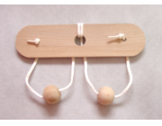 Dřevěný hlavolam prsa